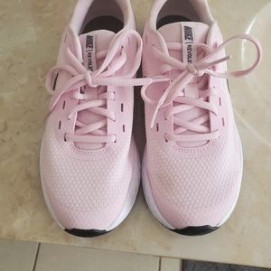 Brand new Baby pink and gray Nike Revolutions
